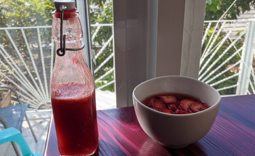 Finished syrup along side macerating strawberries